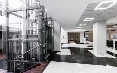 Modern hallway with glass elevator